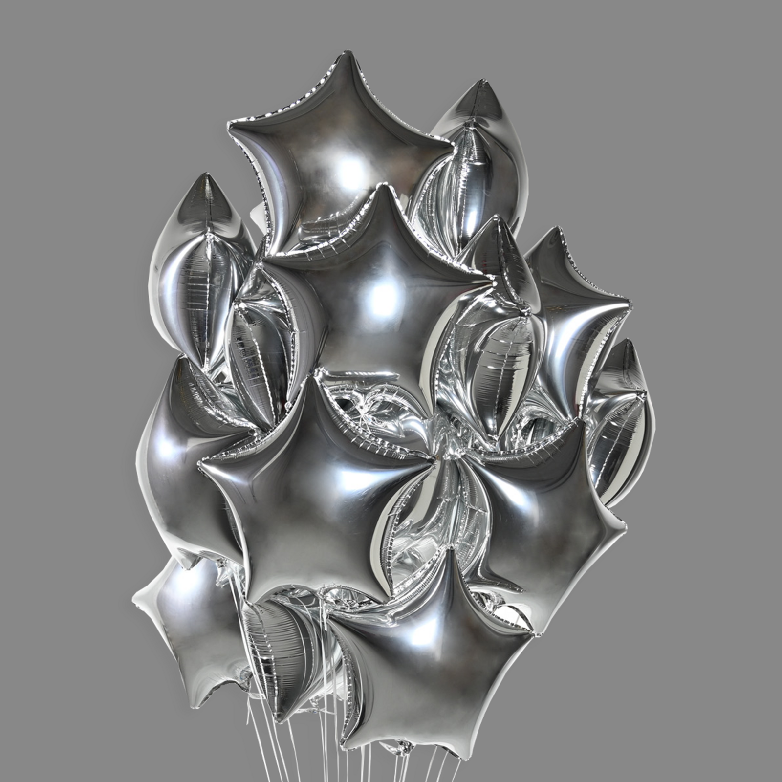 Шары фольгированные звезды серебро (25 шт)